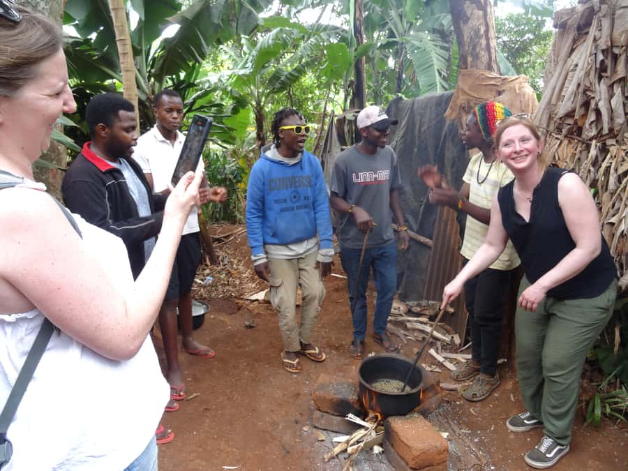 Arusha or Moshi : Hot Spring, Waterfall & Coffee Farm Tour - Walking through Materuni Village to the waterfall