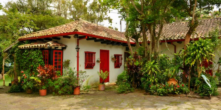 Bogotá: Guided Coffee Tour with Lunch, and Pickup & Drop-Off - Hacienda Coloma and Its Tropical Garden