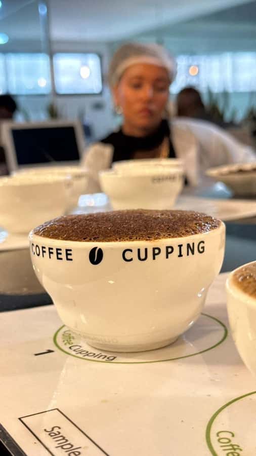 Ethiopia coffee cupping class/Ethiopian food injera making - Making injera on a traditional mitad