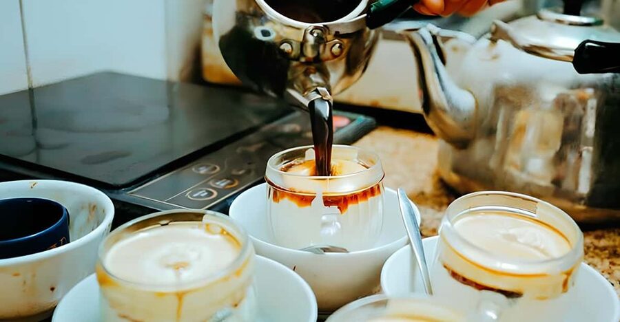 Exploring Vietnamese Coffee Culture, Coffee Making in Hoi An - The meeting-point warning matters