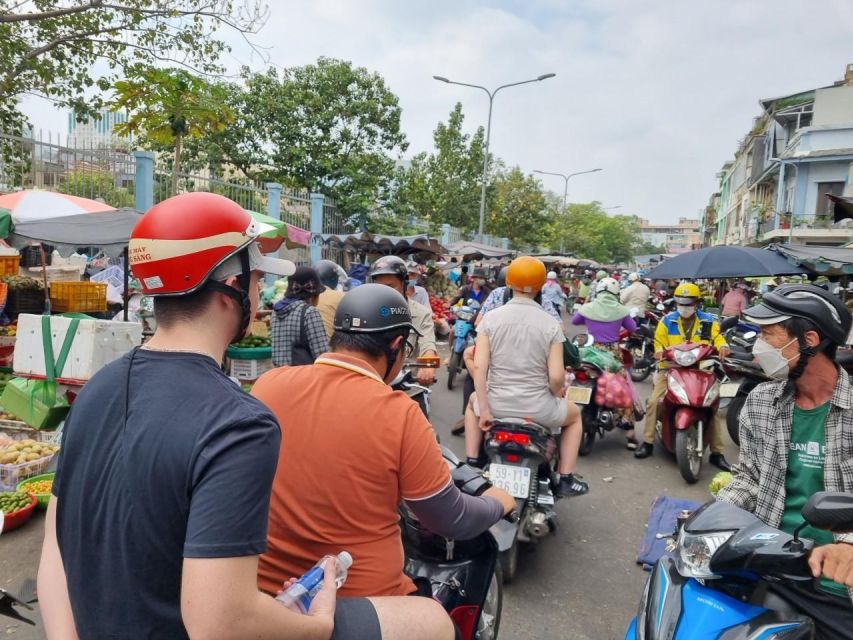 HCM City: Sightseeing Tour with Coffee and Fruit by Scooter - The old apartment area in District 3