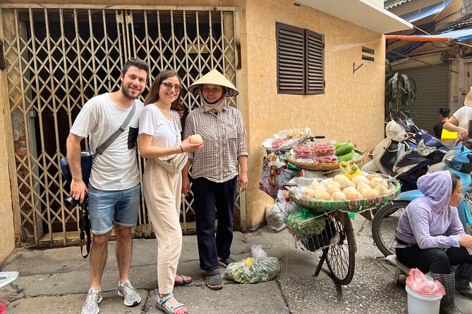 hidden gems cafe - learn making coconut and egg coffee - Dong Xuan Market and a wider view of Hanoi