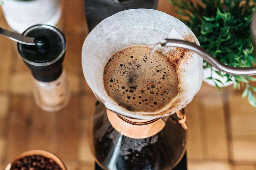 Hoi An: Hands-on Vietnamese Coffee Making Class with Long - Making coffee with the Vietnamese phin filter