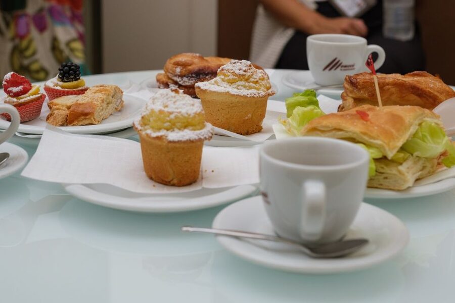 Lucca: Morning Food Tour with Snacks and Coffee - Lucca’s shopping street and old artisan trades