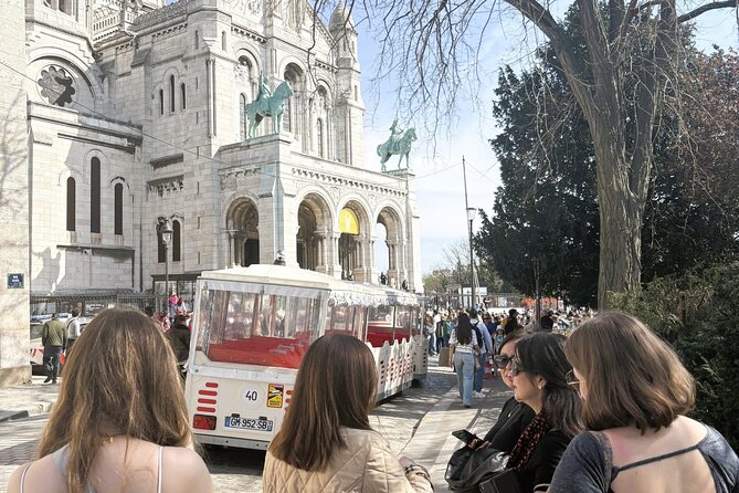 Montmartre & Sacré Coeur : Museum & Coffee In A Tiny Group Tour - Rue Lepic and the artists who walked here