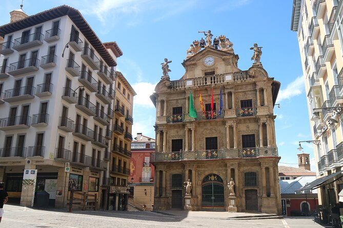 Pamplona Highlights Walking Tour with Coffee and Churros Break - Saints, local identity, and pintxo streets