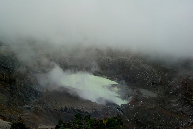 Poas Volcano + Coffee tour + Waterfall tour day from San Jose - Standing above Poas Volcano’s huge crater