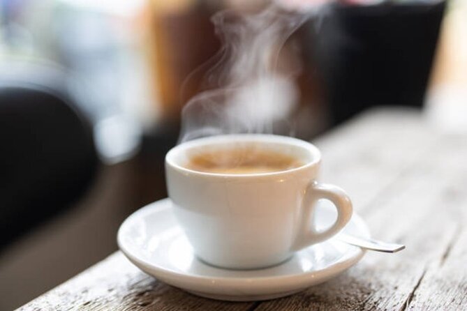 Roasted in Seattle Bean to Cup Coffee Tour - Hands of the World in Pike Place Market