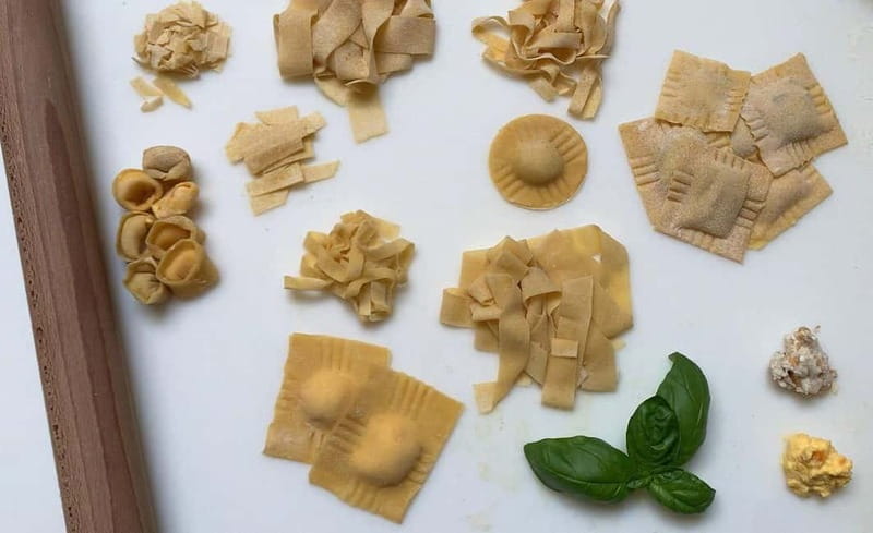 Rome: Pasta Cooking Class with Wine, Coffee, and Limoncello - Tagliatelle, fettuccine, and ravioli on one table
