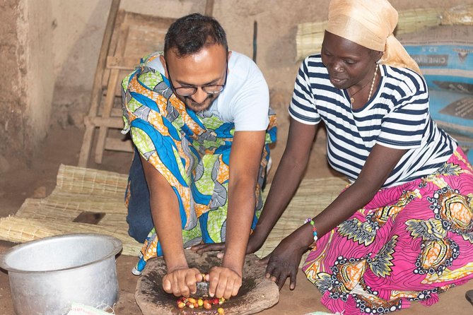 Rwandan Coffee Experience - Fetching water or helping in the kitchen